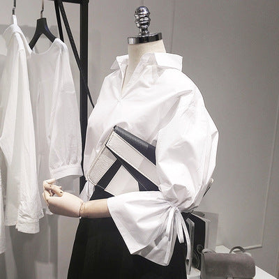 Spring Korean version of the loose V, front, long white shirt lanterns trumpet sleeve strap shirt DropShipMan