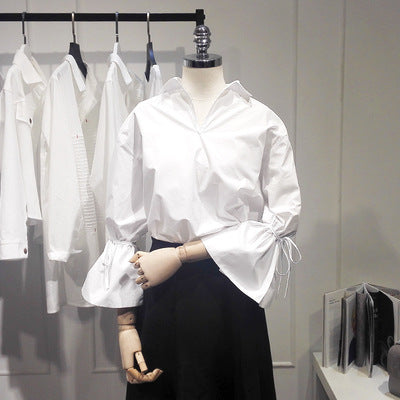 Spring Korean version of the loose V, front, long white shirt lanterns trumpet sleeve strap shirt DropShipMan