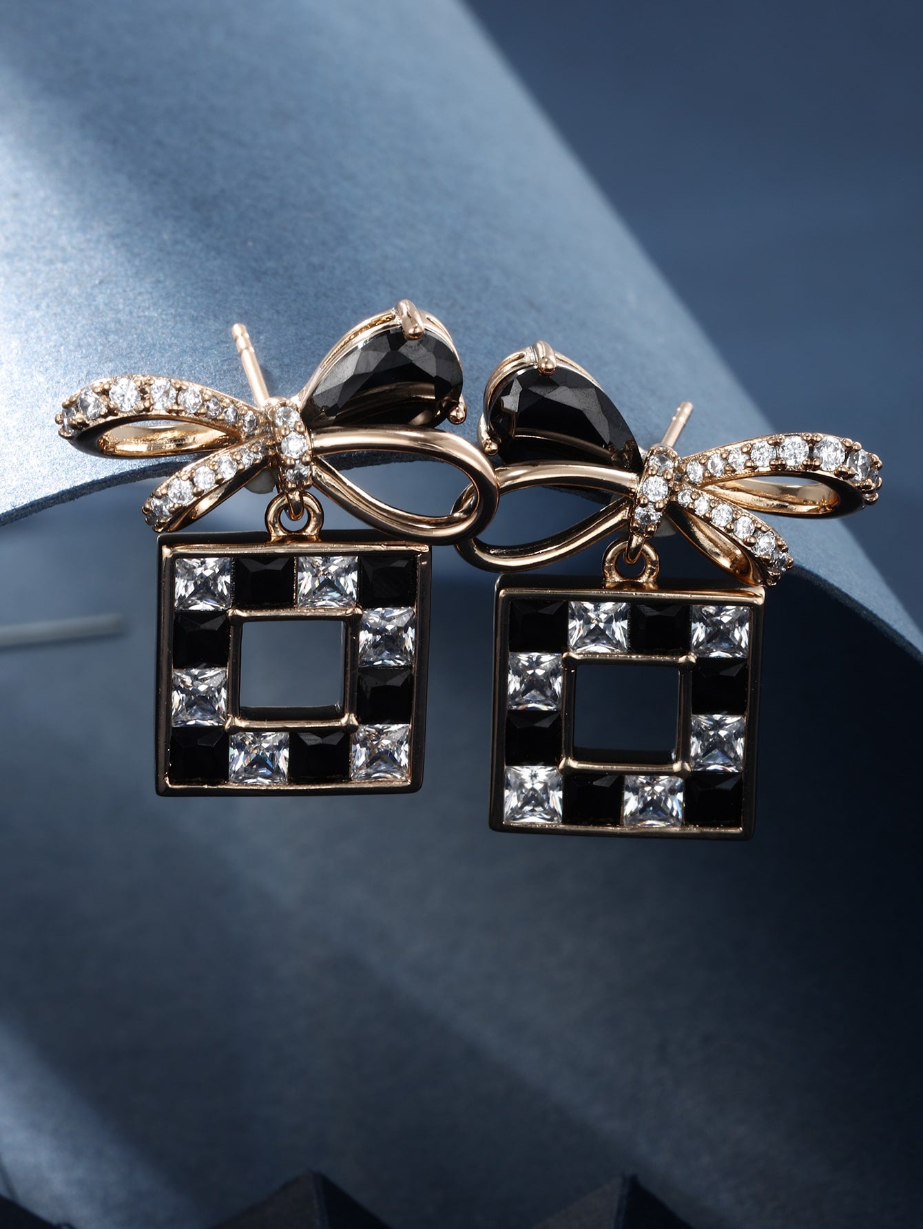 A pair of stylish simple all-in-one imitation jeweled square earrings for women on daily dates for Halloween and Christmas wear